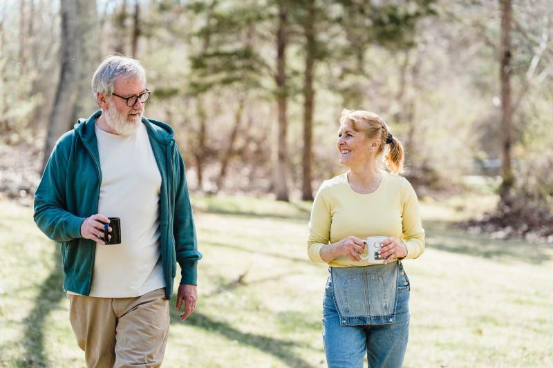 Couple are walking in the forest